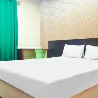 OYO 91936 Hotel Lima Dara，位于TanjungselorTanjung Harapan Airport - TJS附近的酒店