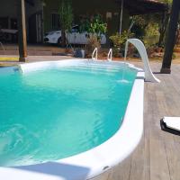 Casa em Caldas - PISCINA SOLAR，位于卡达斯诺瓦斯卡尔迪斯机场 - CLV附近的酒店
