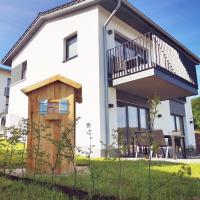 FerienHAUS Marta am Diemelsee im Sauerland mit eigener Sauna, Garten, Terrasse, Balkon und Blick auf den See，位于Diemelsee的酒店