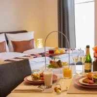 Hotel & Boarding House Schlosserwirt，位于Mering的酒店