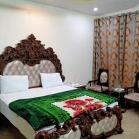 Sk Travellers Inn，位于卡拉奇真纳国际机场 - KHI附近的酒店