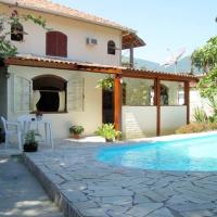 Casa com 6 Suites, piscina e estacionamento，位于伊利亚贝拉Barra Velha的酒店