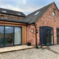 Honeyberry Cottage -PART OF ALTON COTTAGES，位于奥尔顿的酒店