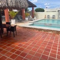 Curasita Colour Appartments & Resort - adres kaya Sucre nst 282，位于威廉斯塔德库拉索国际机场 - CUR附近的酒店