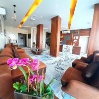 Grand Orchid Hotel Apartment，位于杜科姆的酒店