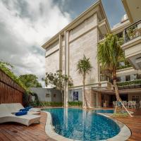 Alron Hotel Kuta Powered by Archipelago，位于库塔拉雅库塔的酒店