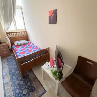 MBZ - Relax Room in Unique Flat，位于阿布扎比阿尔达夫来机场 - DHF附近的酒店