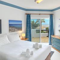 Lovely Apartment in Albufeira 2BD 250m Beach Ocean view and AC Wi-Fi Pool，位于阿尔布费拉Arrifes Beach的酒店