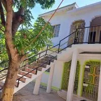 Mango tree Oasis，位于特雷热比奇的酒店