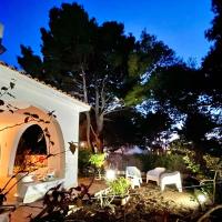 Antonia's Home - casa per le vacanze con giardino e veranda attrezzati，位于圣多米诺的酒店