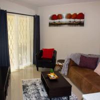 A homely and secure 2 bedroom with uncapped Wifi，位于约翰内斯堡Bryanston的酒店