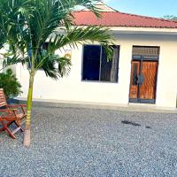 Tulivu House -2bedroom vacation home close to the beach，位于达累斯萨拉姆Kunduchi的酒店