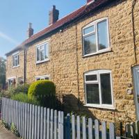 Cosy cottage four miles from Lincoln city centre，位于林肯RAF沃丁顿机场 - WTN附近的酒店