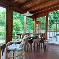 Villetta con giardino a due passi dal mare，位于因佩里亚的酒店