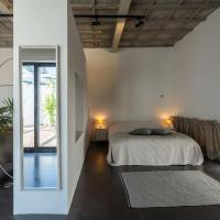 Loft van 90 m² met grote binnentuin.，位于安特卫普Hoboken的酒店