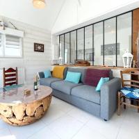 Maison charmante &agrave; Saint-Laurent-sur-Mer avec terrasse，位于滨海圣洛朗的酒店