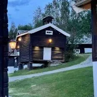 Traditional barn - Glamping - wifi og sauna，位于Baukål的酒店