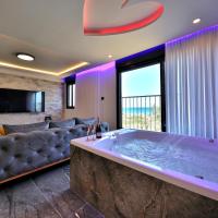 חלום מול הים - סוויטת נופש יוקרתית עם ג'קוזי ונוף לים，位于海法海法机场 - HFA附近的酒店