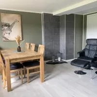 Moderne og familievennlig sokkelleilighet for opptil 6 personer, Gratis parkering & elbillading,位于摩城的酒店