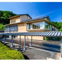 但馬長寿の郷 宿泊棟 夢ロッジ 素泊まりの宿,位于Yabu的酒店