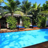 Canto das Laranjeiras Beach Club Guaiuba，位于瓜鲁雅Guaiuba的酒店