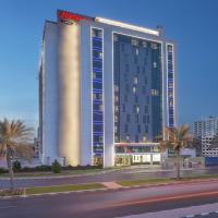 迪拜机场汉普顿酒店 ，位于迪拜阿尔库塞斯的酒店