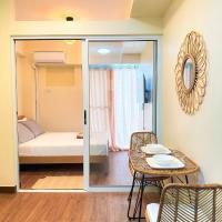 1BR Prisma Residences DMCI Stylish Condo，位于马尼拉巴石的酒店