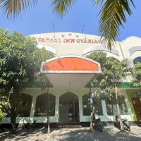 Global Inn Syariah Mitra RedDoorz near Juanda T1 Airport，位于Semampir朱安达国际机场 - SUB附近的酒店