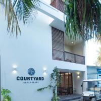 Courtyard Guesthouse，位于呼拉的酒店