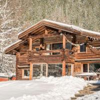 Spectacular Chalet with 5 ensuite bedrooms and sauna，位于夏蒙尼-勃朗峰Les Tines的酒店