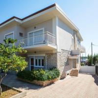 Appartamento 150 mq in villa sul mare a Fertilia，位于费尔蒂利亚的酒店