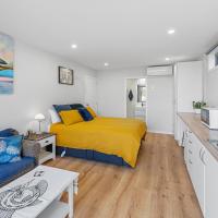 Dee Lightful - Mount Maunganui Holiday Home，位于芒格努伊山陶朗加机场 - TRG附近的酒店