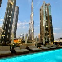 Elegant New 2BR l Spacious with Burj & Fountain Views l near Dubai Mall l Pool l Gym