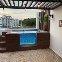 Precioso Apartamento con terraza y Jacuzzi privado，位于JacaguaLa Isabela International Airport - JBQ附近的酒店