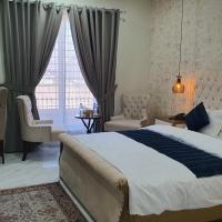 Bloom Rooms，位于伊斯兰堡贝娜齐尔·布托国际机场 - ISB附近的酒店