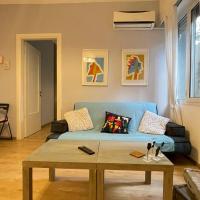 Cozy apartment ideally located city center and Megaron Moussikis metro station，位于雅典Ilisia的酒店
