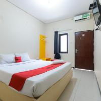 RedDoorz at Osuko Residence Sukomanunggal Jaya，位于泗水Sukomanunggal的酒店