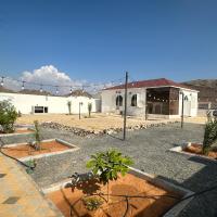 Cozy Mountain House Near Hatta，位于Sinādil的酒店