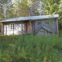 Einfache Holzhütte für das wahre Naturerlebnis am Stausee，位于YtterhogdalSveg Airport - EVG附近的酒店