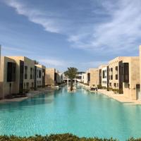Bright & Lovely 2 Beds Apartment in Scarab Club, El Gouna，位于赫尔格达艾高娜的酒店