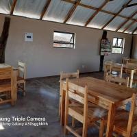 Inkwazi Getaway Lodge，位于曼齐尼Matsapha International - MTS附近的酒店