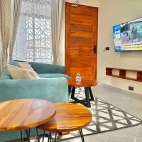 1 Bedroom Apt FAM Homes Tabata，位于达累斯萨拉姆的酒店
