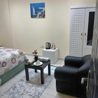 MBZ - Pleasant Tidy Room，位于阿布扎比阿尔达夫来机场 - DHF附近的酒店