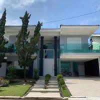 Casa em Guarujá-Jardim Acapulco，位于瓜鲁雅Jardim Acapulco的酒店