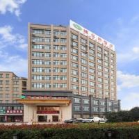 Vienna Hotel Shandong Heze Central New City，位于定陶Heze Mudan Airport - HZA附近的酒店
