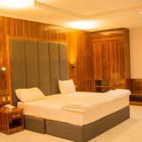 Jimaco Hotels and Suites，位于乌约Calabar Airport - CBQ附近的酒店