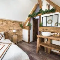 LE RELAIS DES CALECHES - La Jungle Room，位于Broué的酒店