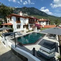 Tomsan Suites & Villas Akyaka，位于阿奇亚卡的酒店