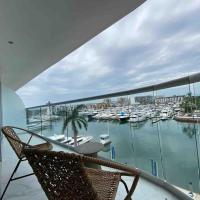 NEW Nautico with Marina View and Rooftop Pool plus Gym，位于巴亚尔塔港古斯塔沃·迪亚斯·欧勒达斯机场 - PVR附近的酒店