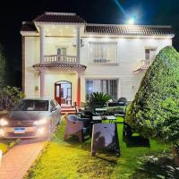 private Villa with a special view，位于Qaryat Shākūsh博格埃尔阿拉伯国际机场 - HBE附近的酒店
